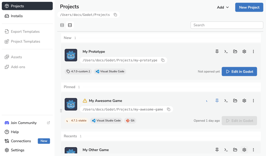 Project showing its saved Godot editor version and download progress after Project Settings closes