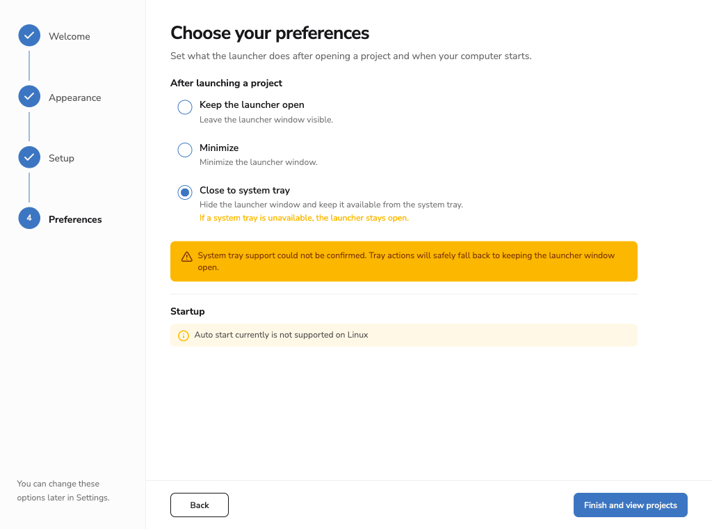 Linux Preferences warning that tray actions will keep the launcher window visible